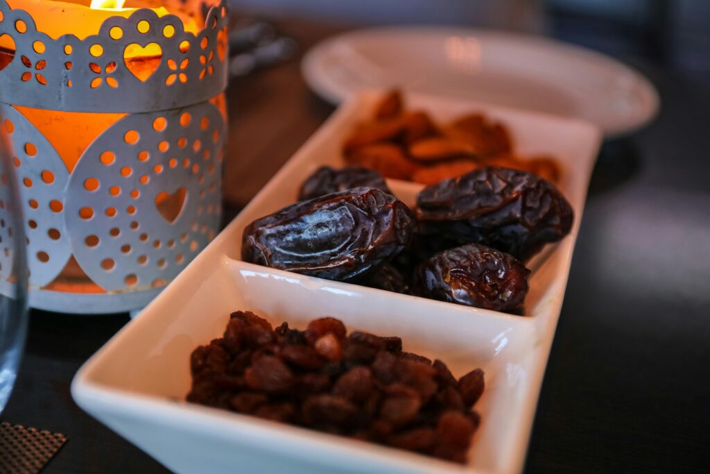 pexels-photo-2291592-2291592 Close-up of dried dates and lantern symbolizing Ramadan traditions. Ideal for festive themes.