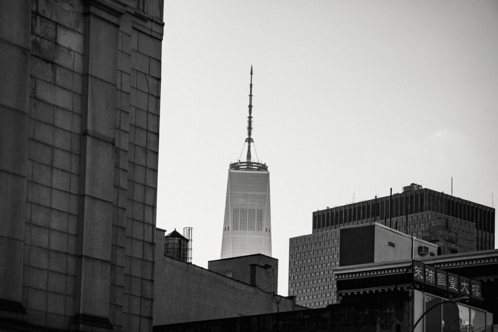 pexels-photo-5847567-5847567 A black and white view of an urban skyline featuring modern skyscrapers and architectural details.